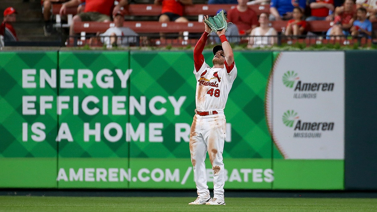 Harrison Bader catches a fly ball