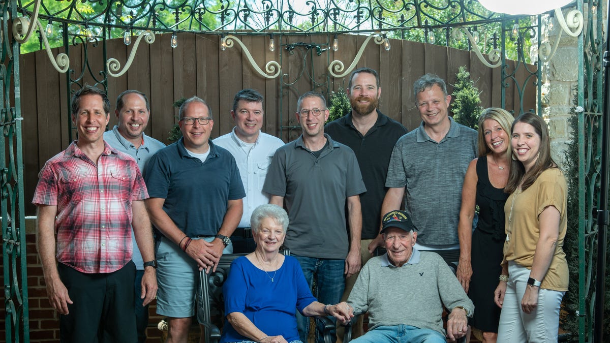 Whisler with nine grandchildren
