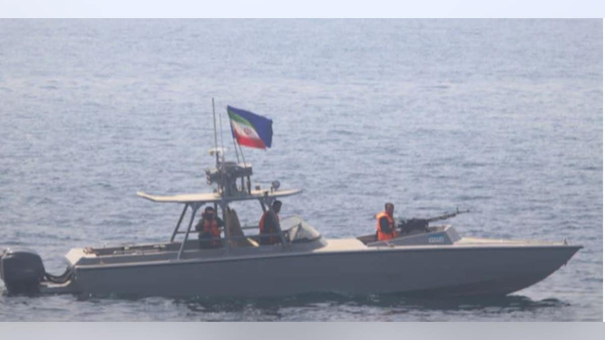 An Iranian naval vessel challenges the USS Sirocco.