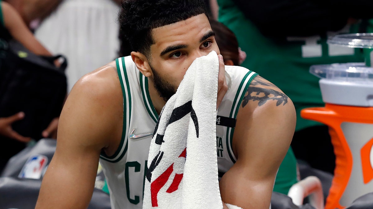 Jayson Tatum takes in the loss