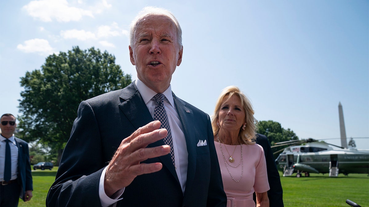 President Biden answers questions from reporters on the White House South Lawn