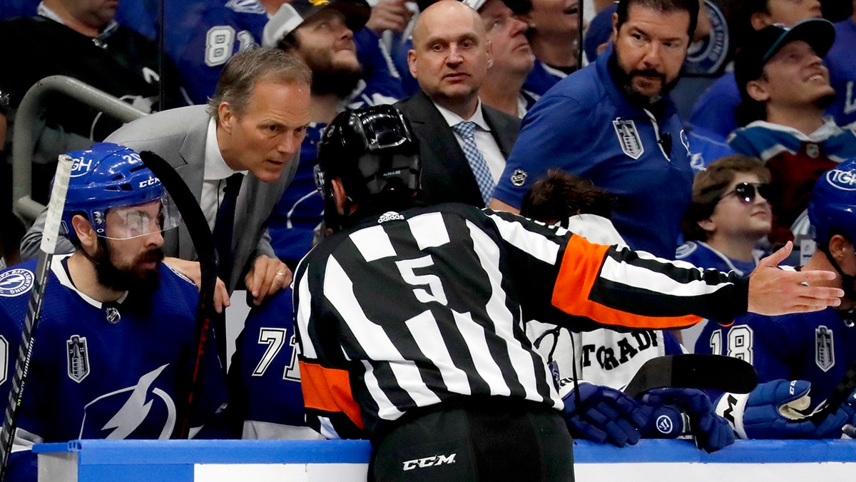 Jon Cooper talks to the linesman