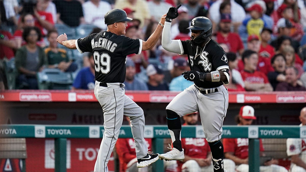 Chicago White Sox's Jose Abreu smiles after hitting a two-run double during  the seventh inning of a baseball game against the Los Angeles Angels  Tuesday, June 28, 2022, in Anaheim, Calif. (AP