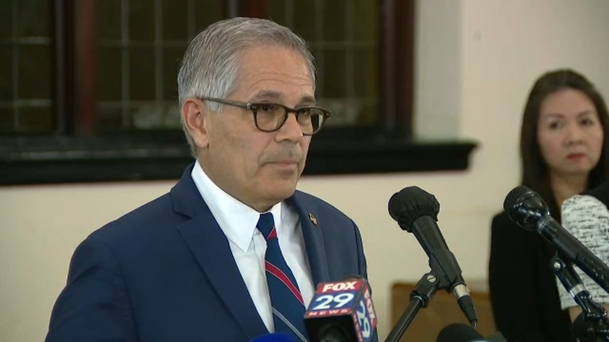 Larry Krasner speaks to reporters