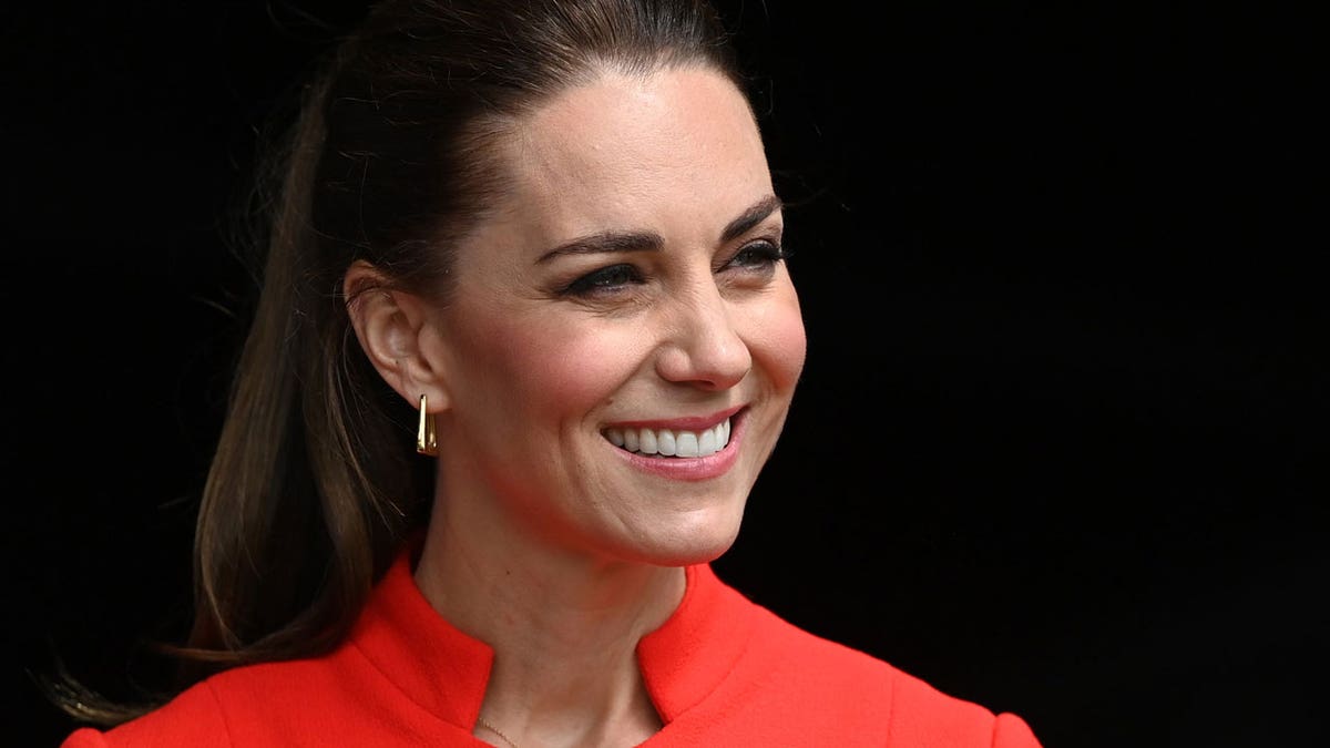 Kate Middleton smiles for a photo