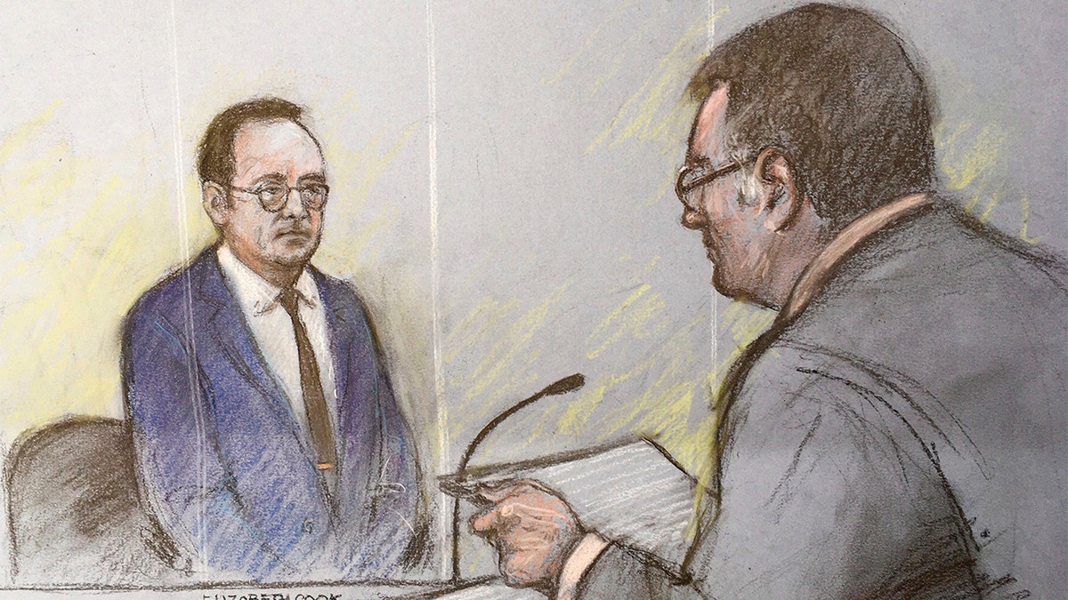 Kevin Space sits in court in London