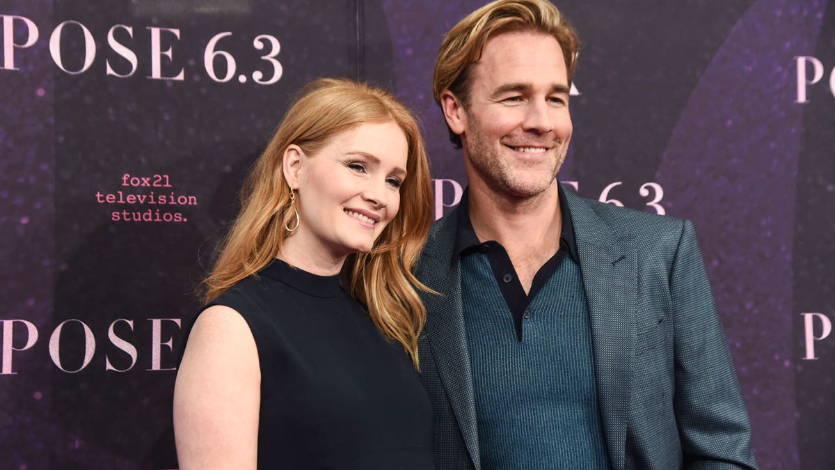 James and Kimberly Van Der Beek pose on the red carpet