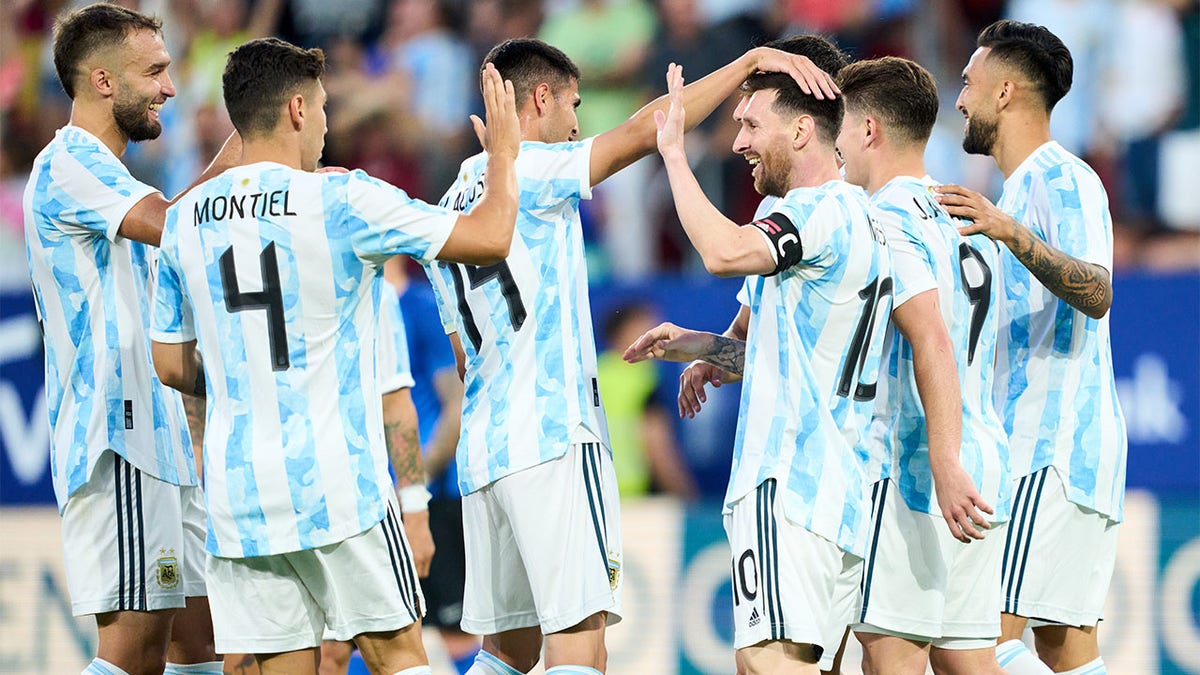 Lionel Messi celebrates goal with team