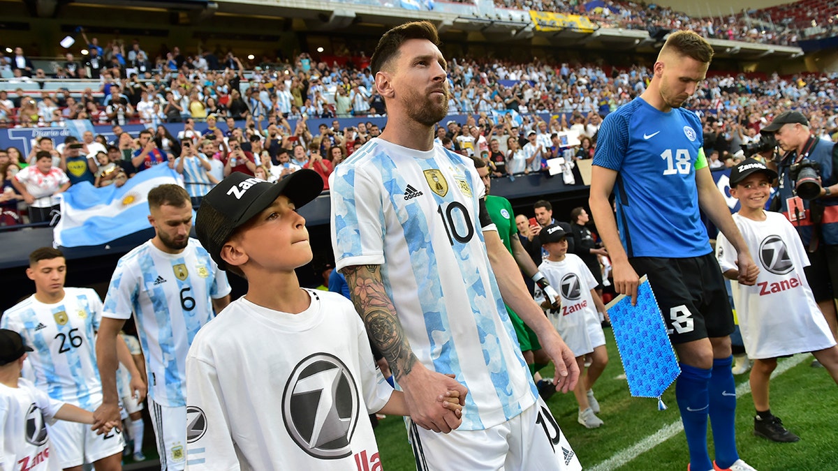Lionel Messi takes the field