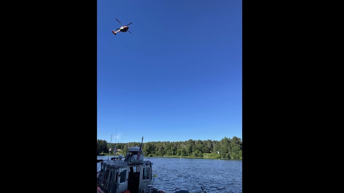 helicopter searches Merrimack River for missing boy