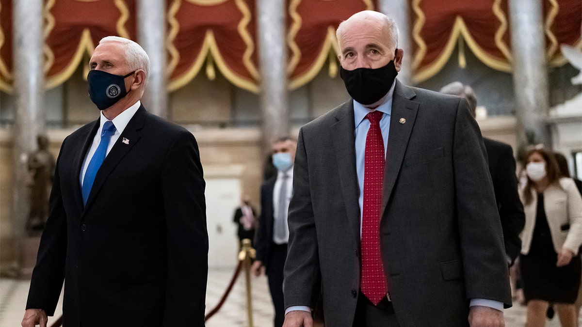 Senate Sergeant at Arms Michael Stenger with Vice President Mike Pence on Jan. 7, 2021