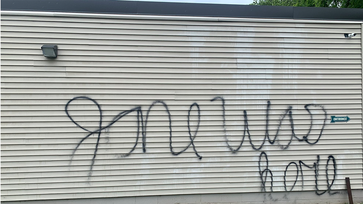 Photo showing pro-life CompassCare office vandalized in New York with "Jane was here" graffiti