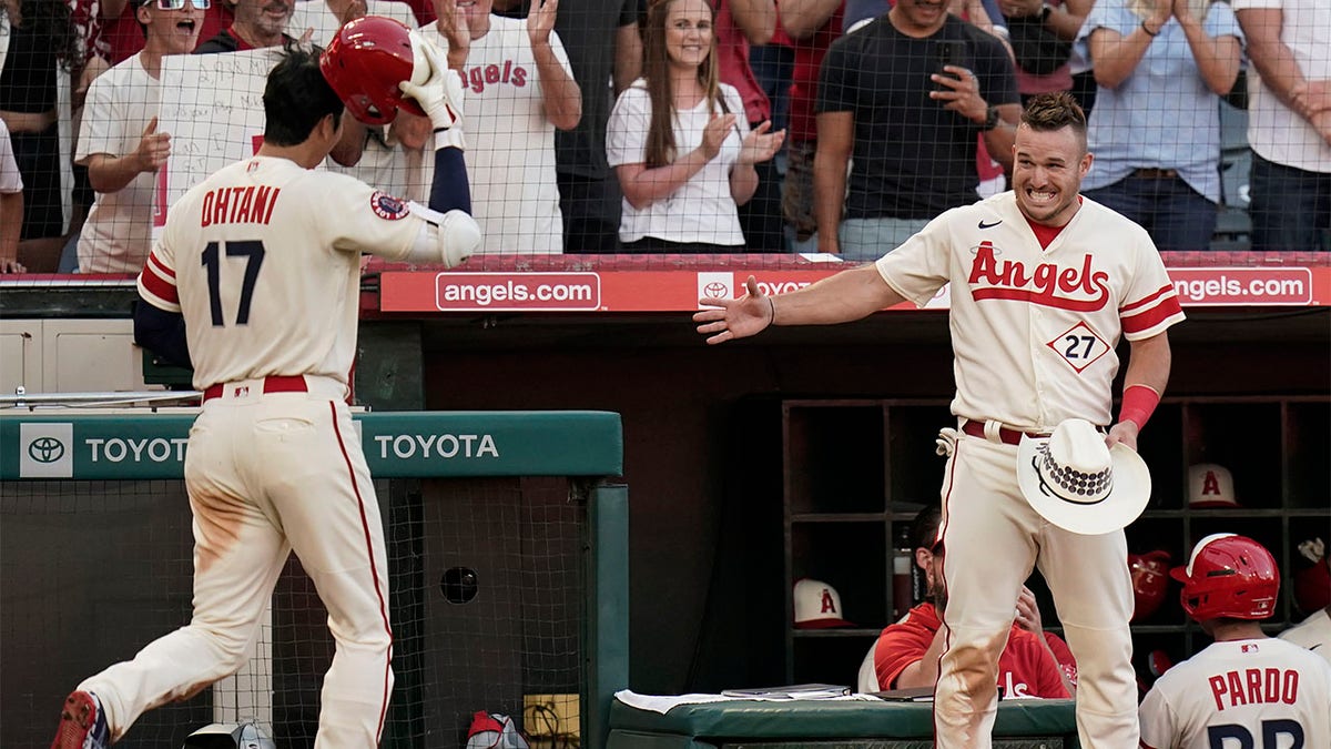 Shohei Ohtani and Mike Trout get ready to high-five