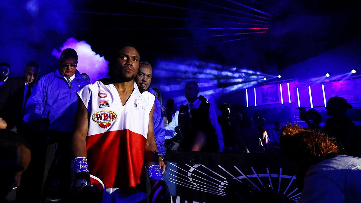 Alexis Angulo walks to the ring