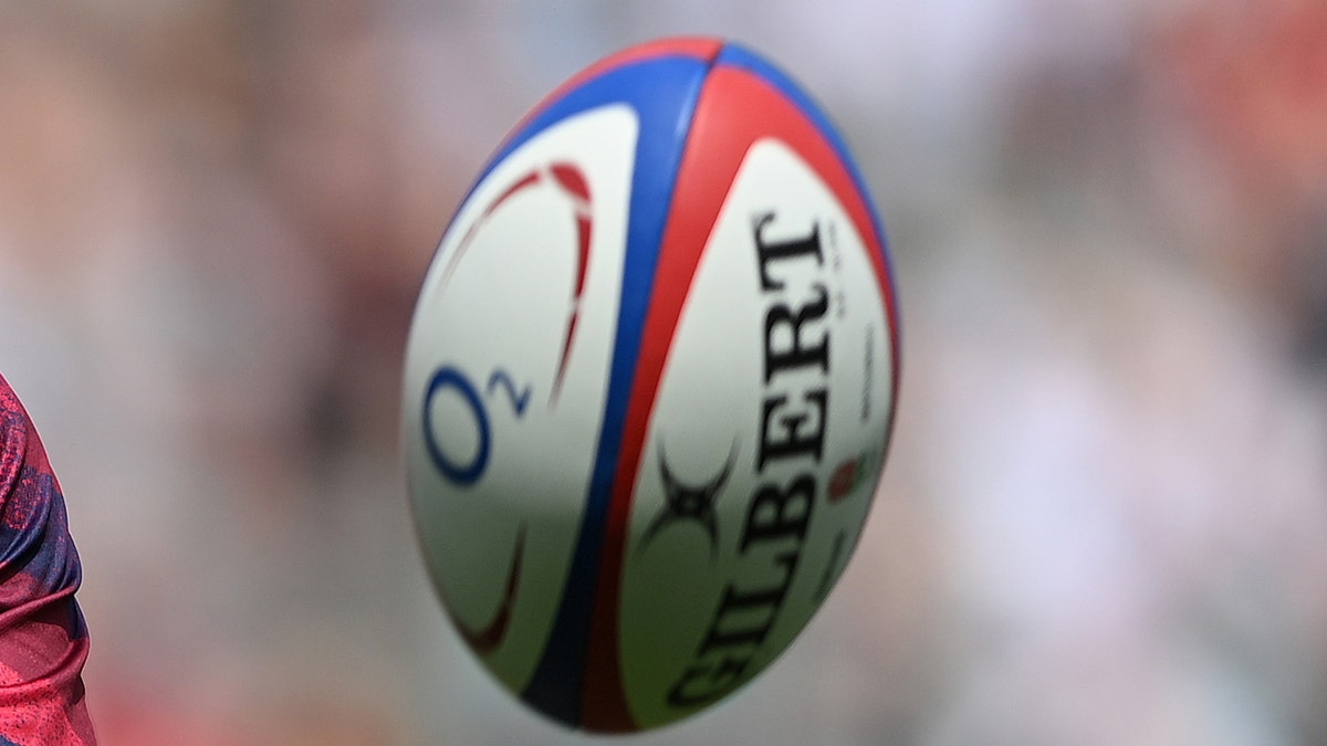 A rugby ball being thrown