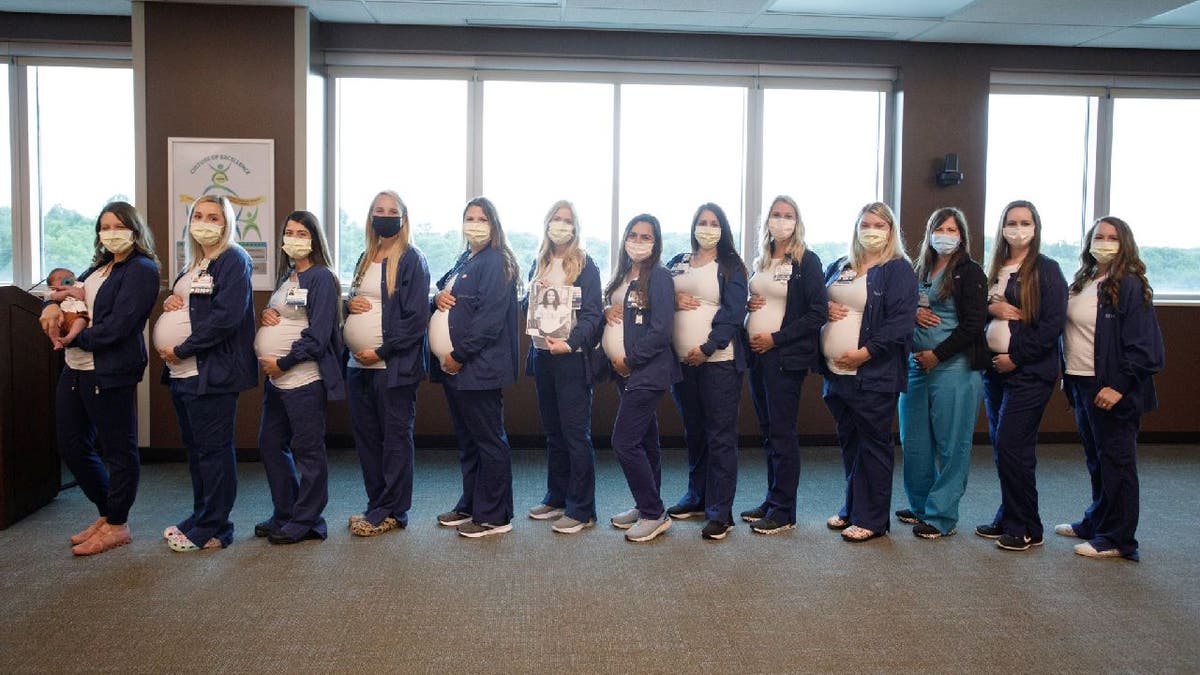 Pregnant nurses at Saint Luke's East Hospital pose together