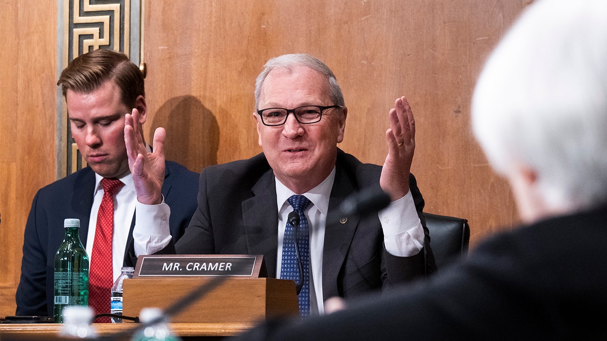 Sen. Kevin Cramer asks a question during a Senate banking committee hearing