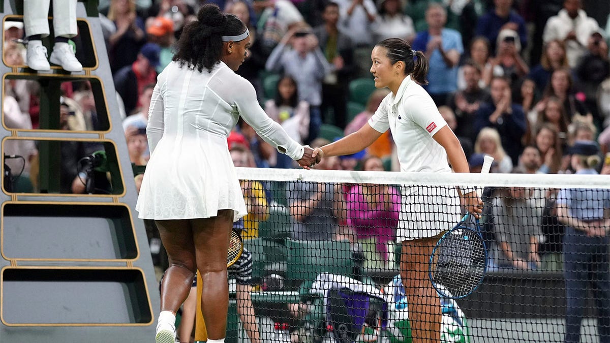 Serena Williams and Harmony Tan shake hands