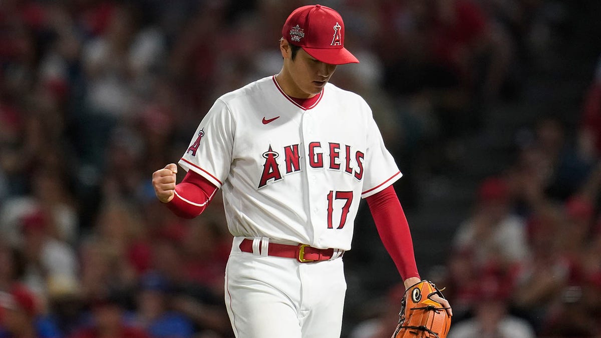 Shohei Ohtani celebrates walking off the mound