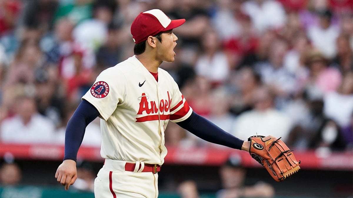 Shohei Ohtani yells after striking out a hitter