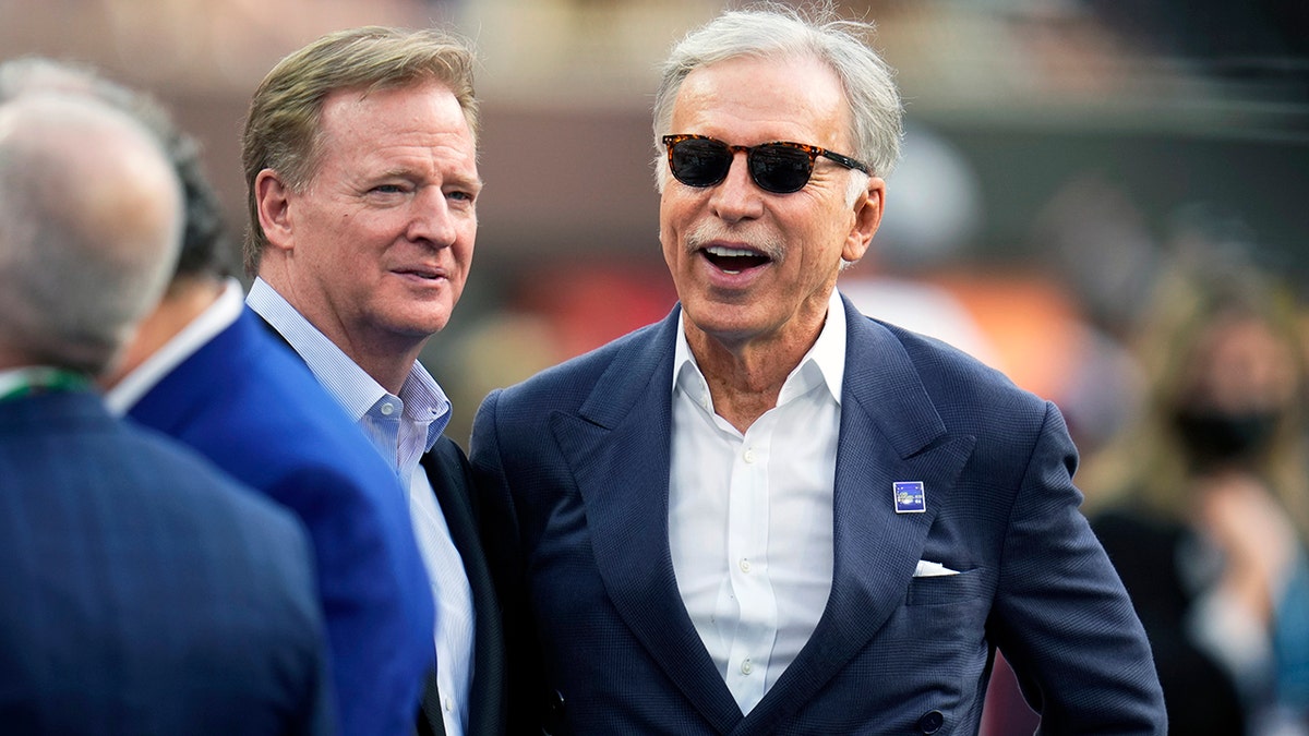 Stan Kroenke with Roger Goodell in February 2022