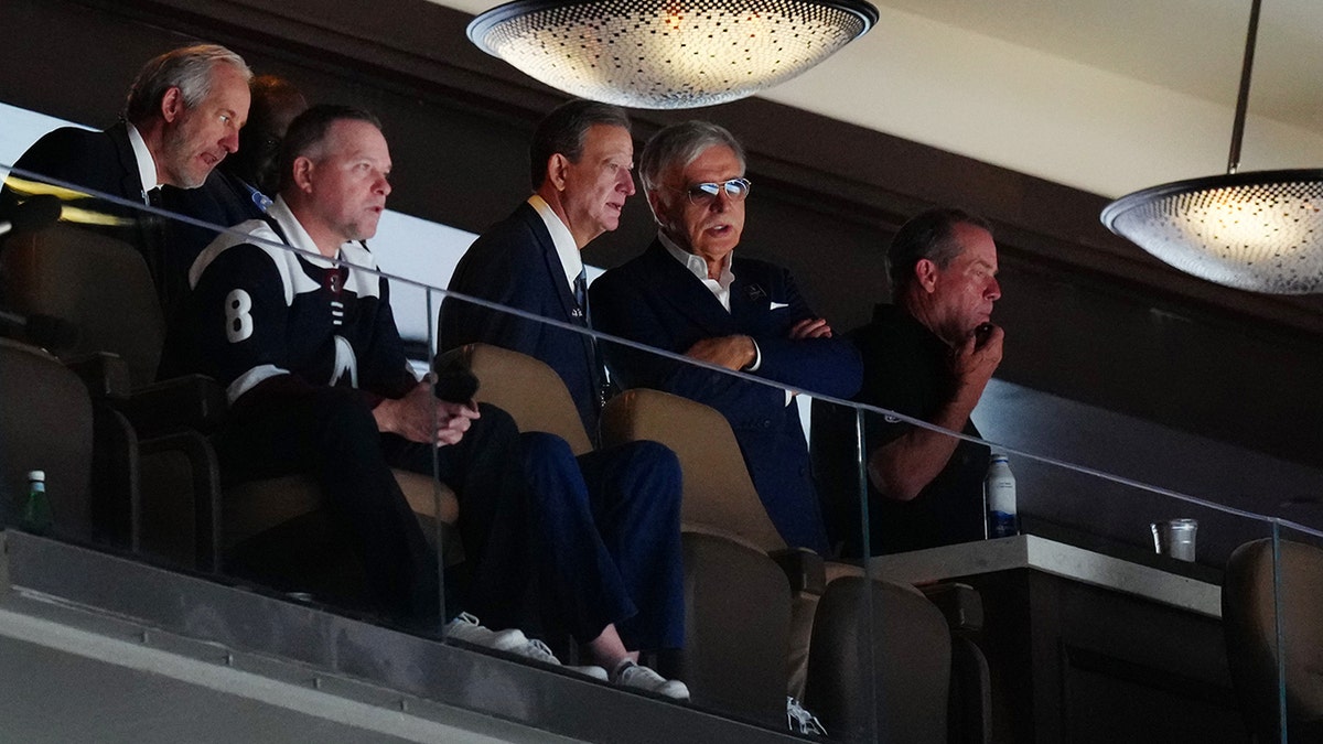Stan Kroenke watches the Avalanche