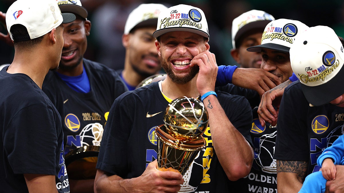Steph Curry celebrates NBA Finals MVP Award