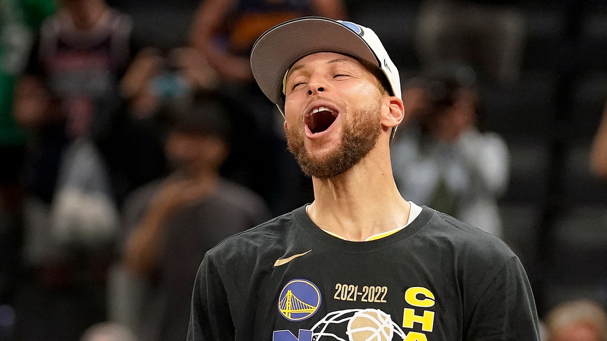 Steph Curry celebrates his NBA Finals MVP