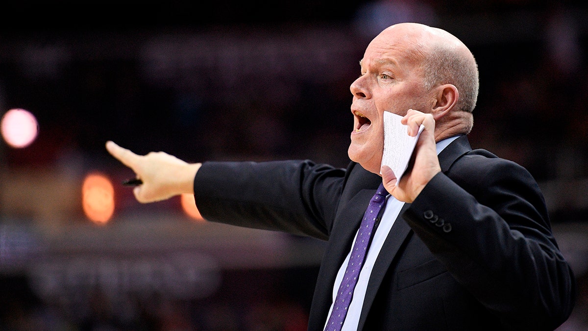 Steve Clifford points during a basketball game
