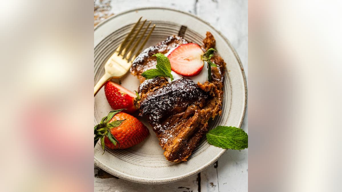 Strawberry french toast served on white plate