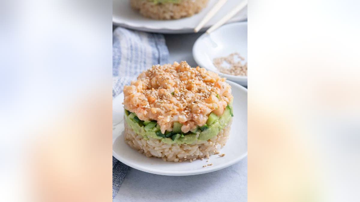 Sushi stack on white plate