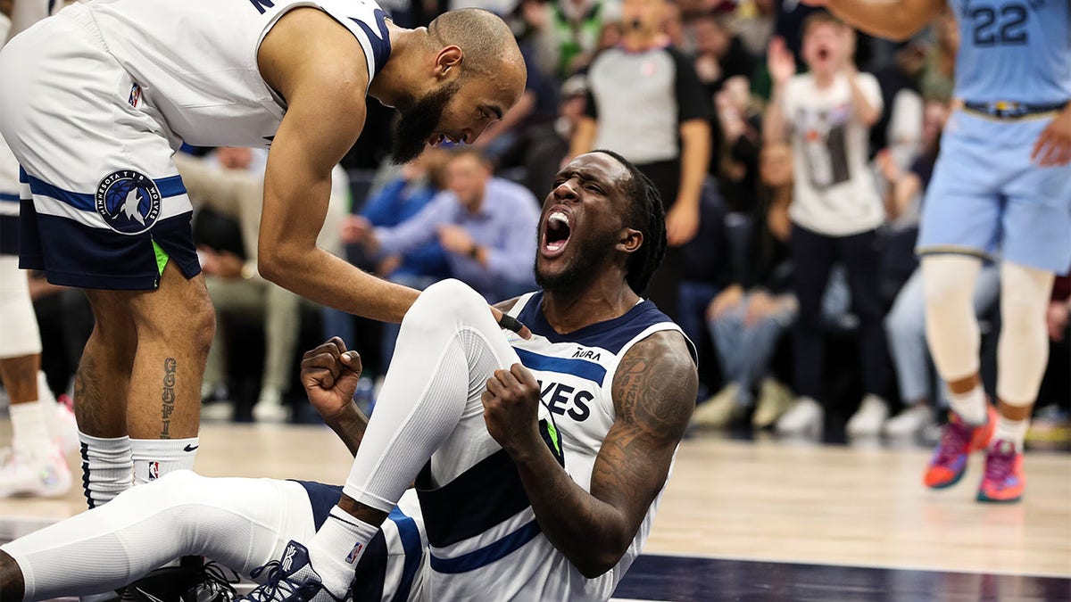 Taurean Princes fistpumps on the floor