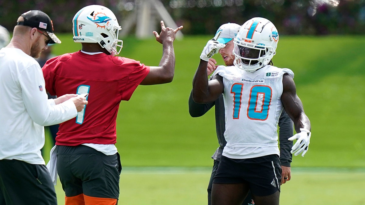 Tyreek Hill and Tua Tagovailoa