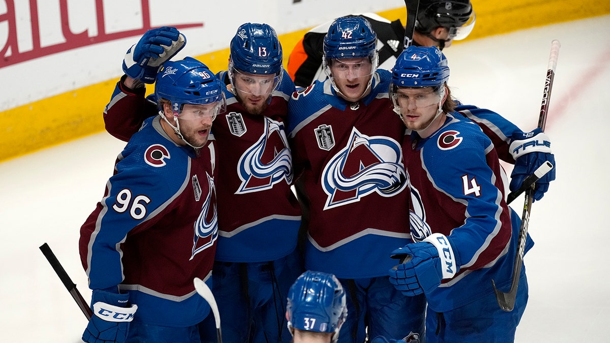 Valeri Nichushkin celebrates with teammates