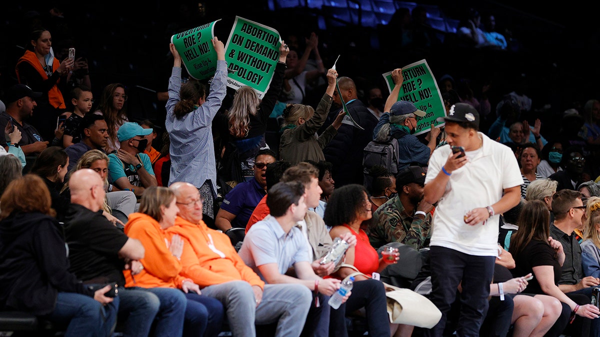 Pro-choice activists at a WNBA game