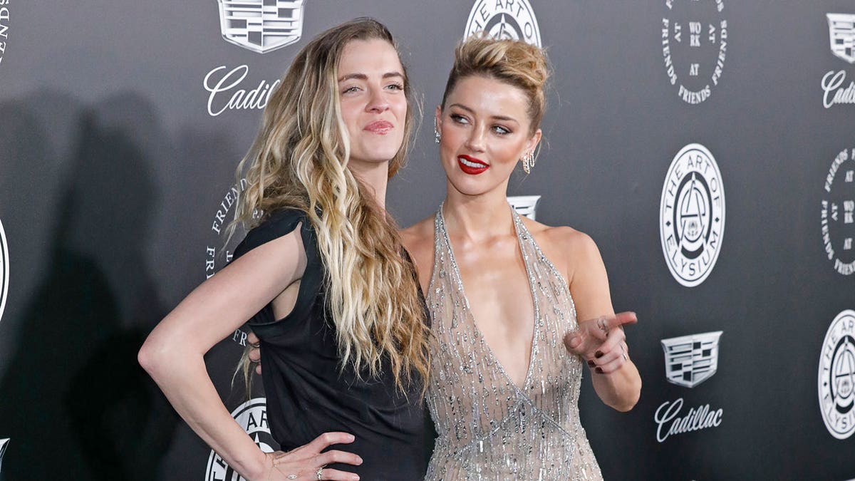 Amber Heard and Whitney on the red carpet