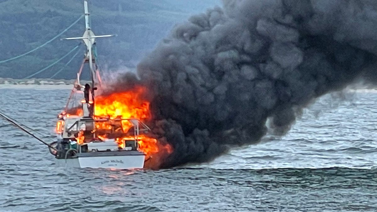 Fisherman rescued boat fire