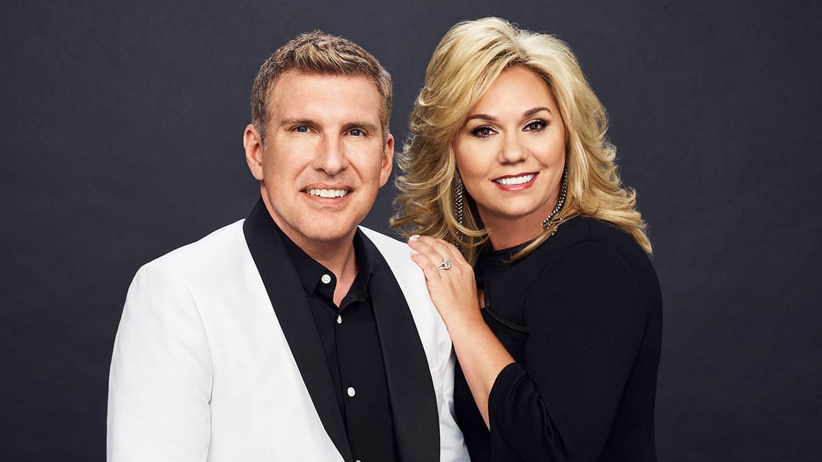 Todd and Julie Chrisley posing for the camera