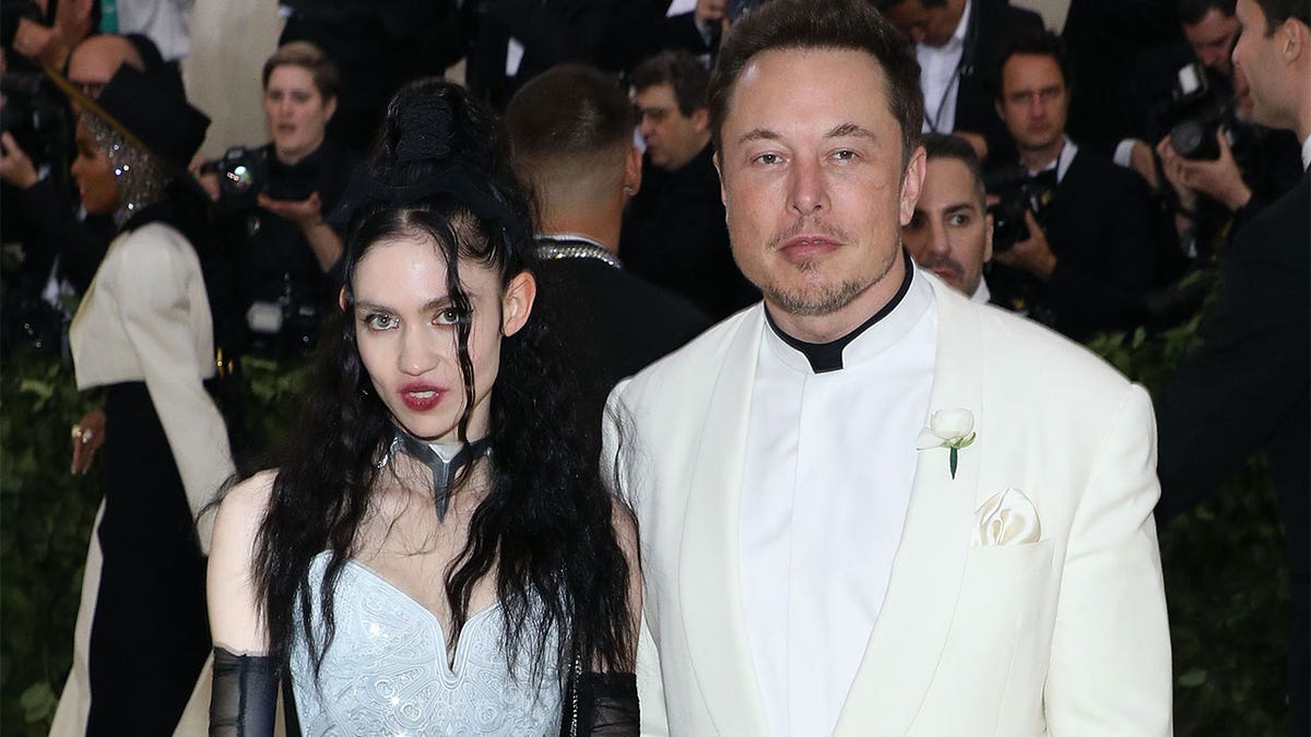 Grimes with ex boyfriend Elon Musk at an event