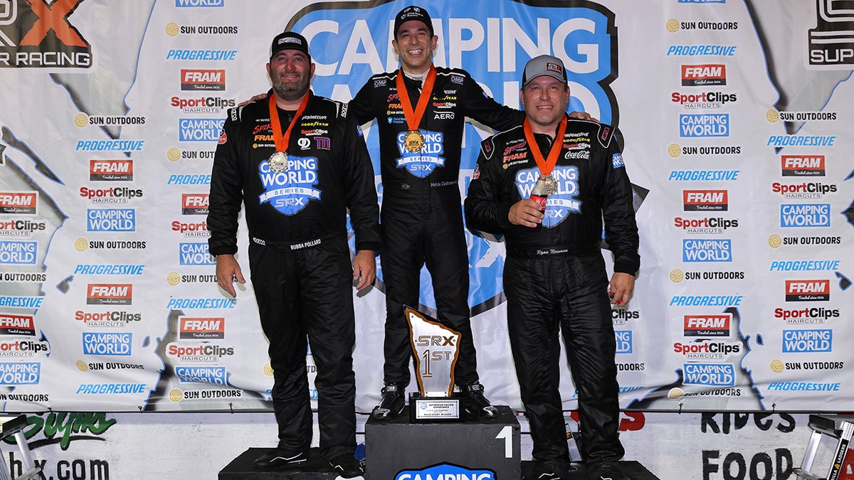 Bubba Pollard and Ryan Newman joined winner Helio Castroneves on the podium.