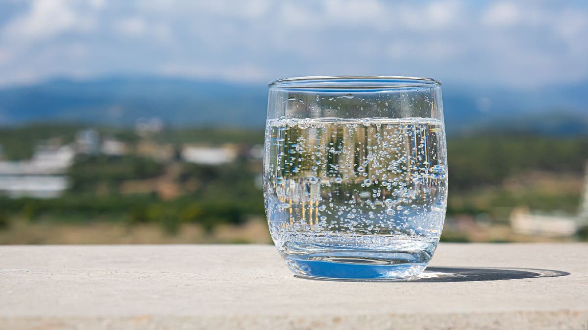 Sparkling water in glass cup