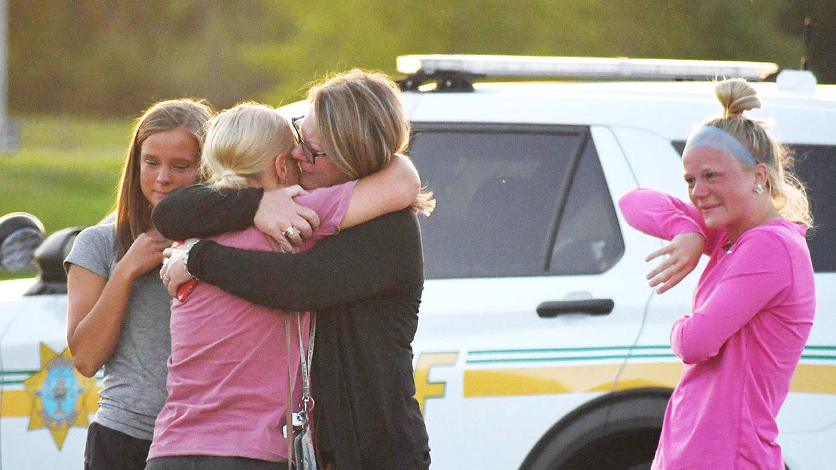 Iowa church shooting mourners