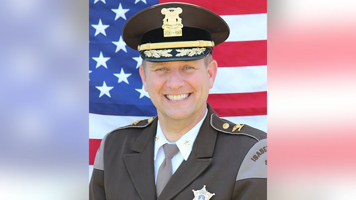 Michigan Sheriff Michael Main smiles in official photo