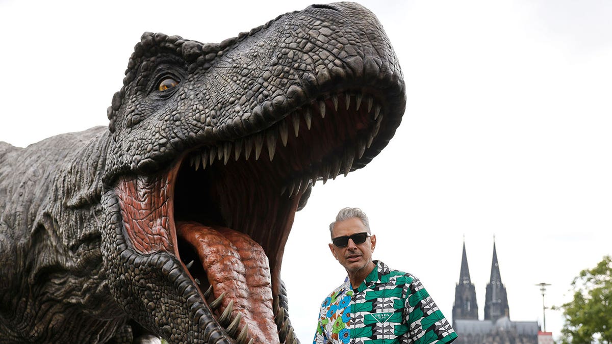 Jeff Goldblum poses with t-rex