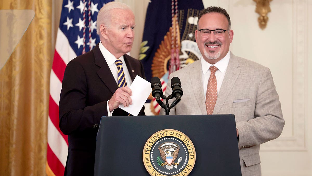 President Joe Biden and U.S. Education Secretary Miguel Cardona 