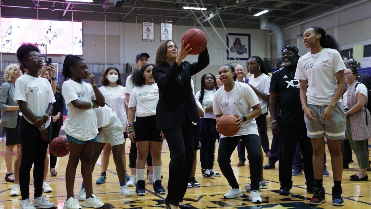 Kamala Harris shoots basketball