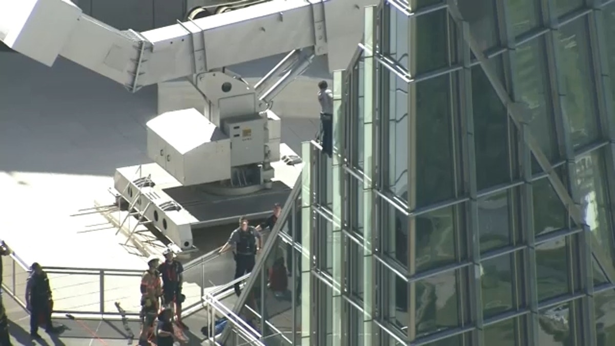 Pro-life protester reaches top of Devon Tower