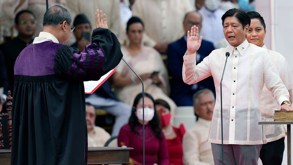 Ferdinand Marcos Jr. is sworn in by Supreme Court Chief Justice