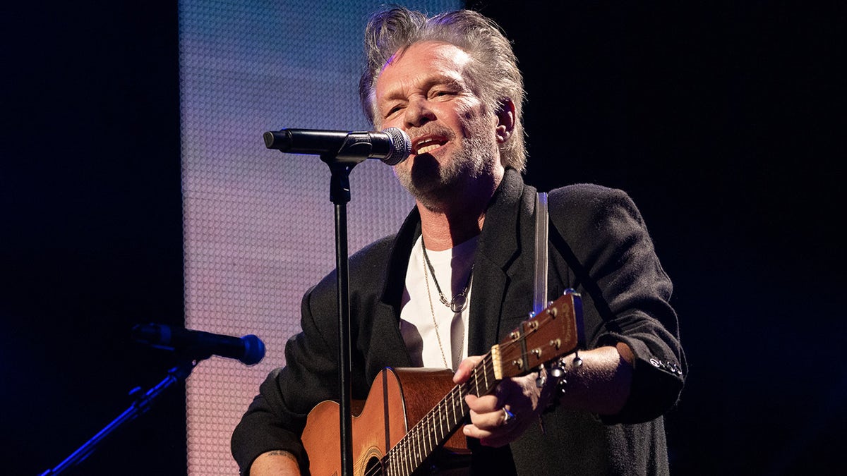 John Mellencamp played the guitar at FarmAid