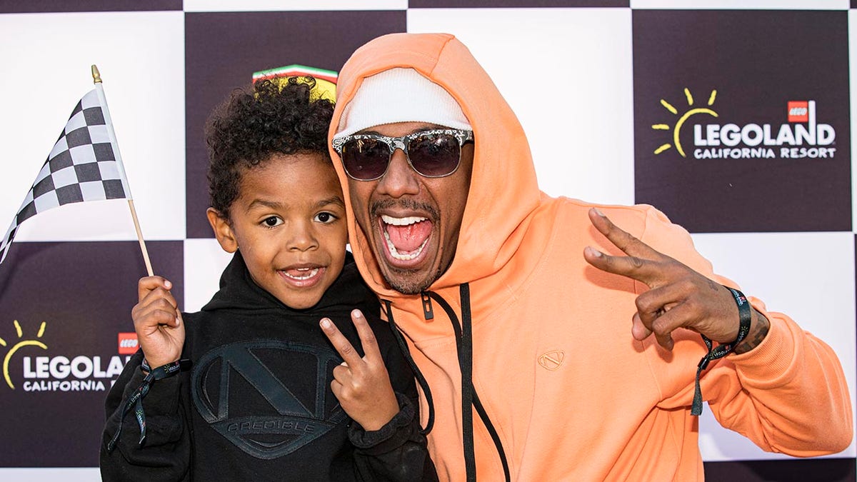 Nick Cannon with his son